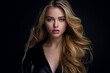 © Nikname - Beautiful young woman, modern with makeup, in a black top and a black leather jacket.