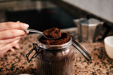 Scooping Coffee Grounds