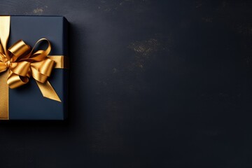 Poster - A beautiful blue gift box with a shiny gold bow, perfect for any special occasion or celebration.