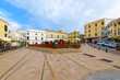 An outdoor children's playground in Plaça Bastió, a popular central plaza square in the historic center of the old town of Mahon, Spain, on the Mediterranean island of Menorca.
