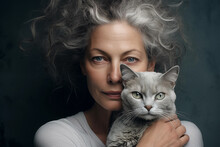 Gorgeous Mature Woman Middle Age With Long Grey And White Hair Holding Her Cat