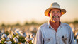 © PaulShlykov - Portrait of Farmer in Field of Cotton