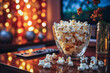 popcorn in a glass as snach for home cinema evening