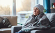 © ink drop - A senior person wrapped up in a scarf and hat during winter. Cost of living Heating gas bill