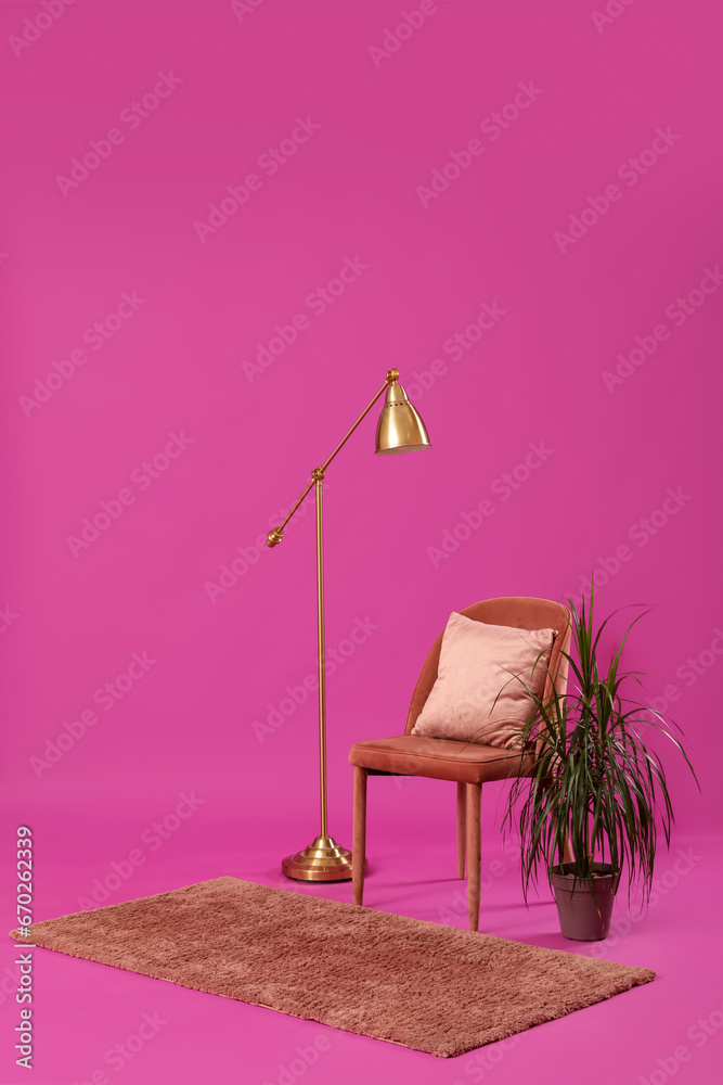 Chair with lamp, palm and rug on purple background