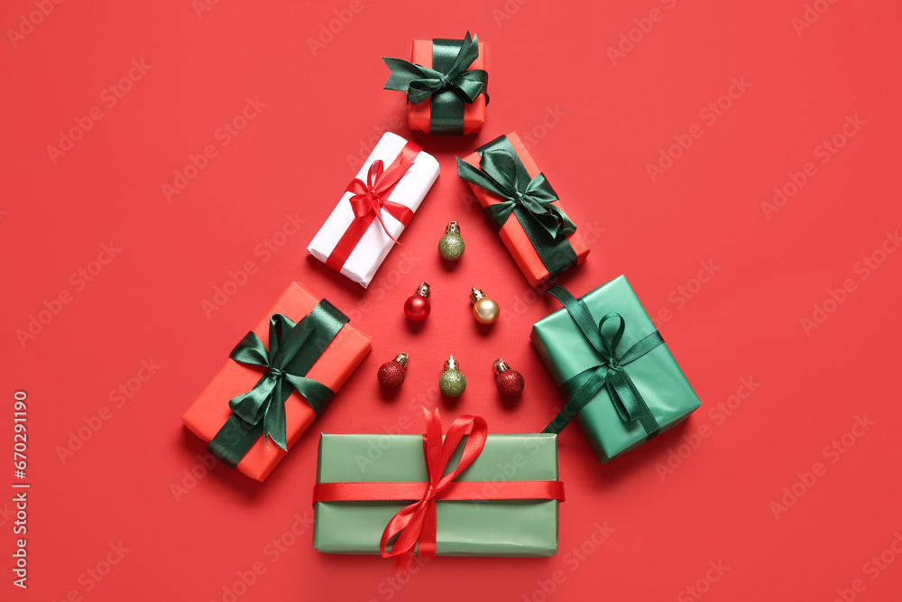Christmas tree made of gift boxes and balls on red background