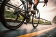 pedaling cyclist bike road Detail bicycle bicyclist speed action movement man velocity sport cycling effort race male cycle caucasian wheel biker riding ride biking rider muscular tension athlete fi