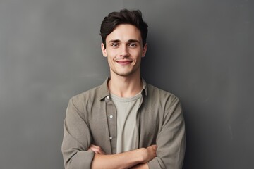 standing man casual young happy portrait male people attire joyful crossed adult isolated guy smile attractive background photogenic stubble field men at work style looking confident arm