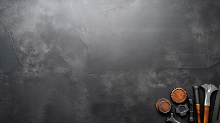 Top view of construction tools on blackboard background with copy space