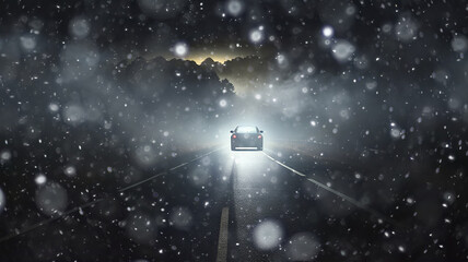 Wall Mural - blizzard on the road, dangerous snowfall on the highway car in poor visibility, fog in winter bad weather, blurred background