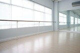 an unoccupied ballet barre in a dance studio