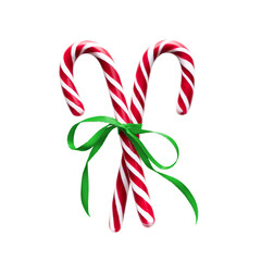 candy canes with green ribbon isolated on a white background