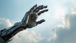 © KikkyCNX - Close up of a humanoid robotic hand reaching out against blue sky background