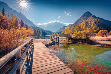 Poster - Bright autumn day on the shore of the Jasna lake. Astonishing summer scene of Julian Alps, Gozd Martuljek location, Slovenia, Europe. Colorful landscape of Triglav National Park.