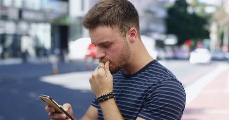 Phone, stress and man in city with worry for social media news, negative text message and notification. Communication, networking and person unhappy, upset and confused on smartphone in urban town