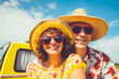 © Alvaro - Smiling couple in red sunglasses and vacation hats with a camper in the background on a sunny day