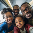 Selfie of a black family on a plane. Familiar trip.