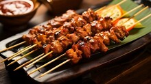 Indonesian Sate Sticks Made Of Chicken On Mini Presentation Grill On Restaurant Table, Delicious Traditional Food