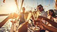 Group Of Friends Having Fun Together And Drinking Champagne While Sailing In The Sea On Luxury Yacht, Traveling And Yachting Concept.