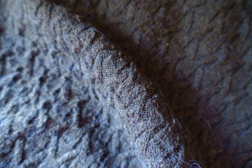 Wall Mural - Soft fold on dark navy blue knitted woolen fabric