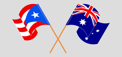 Crossed and waving flags of Puerto Rico and Australia