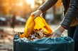 © nsit0108 - Woman opening bin to throw trash bag full of garbage. Open recycling dirt packing. Generate Ai