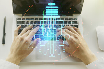 Poster - Creative light bulb with chip hologram and hands typing on computer keyboard on background, artificial Intelligence and neural networks concept. Multiexposure