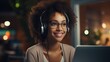 Portrait of young afro american woman in eyeglasses and headphones using laptop at home Generative AI