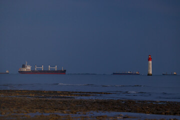 Wall Mural - Phare de Chauvea near Ile de Re with ships to La Rochelle, Pays de la Loire, France