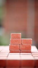 Wall Mural - A stack of red bricks sitting on top of a table, AI