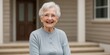 Happy senior woman living in a nursing home, beautiful background with copy space