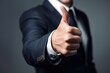 Professional Approval: Thumbs Up in Business Attire