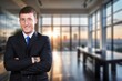 © BillionPhotos.com - Smiling confident business man standing in office, AI generated image