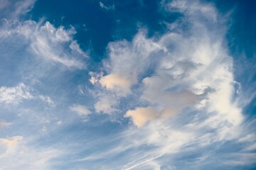 Wall Mural - White clouds in the blue sky. Sky with air clouds