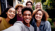 © PETR BABKIN - MULTIETHNIC HAPPY GROUP OF YOUNG PEOPLE TAKING SELFIE. legal AI