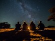 © SobrevolandPatagonia - Silhouette of group of people looking at the stars.