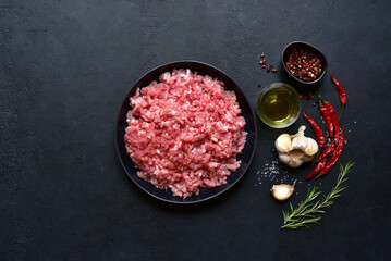 Wall Mural - Homemade minced meat with spices. Top view with copy space.