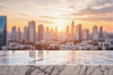 Fototapeta Nowy Jork - Empty White Marble Table with Blurred City Skyscraper Scape View Landscape Background at Dawn or Dusk