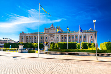 Wall Mural - Riksplan park and Swedish parliament The Riksdag house front facade view