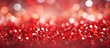 A blurred and abstract circle of red bokeh glows with a glittering shimmer adding a touch of brightness and luxury Its white and silver elements glisten and twinkle creating a textured wallp