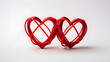 La unión perfecta: dos corazones entrelazados en San Valentín dos corazones rojos lineas minimalistas