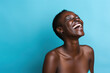 © Sergio - black woman smiling and laughing