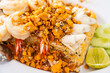 Delicious seafood thai fried rice (crab meat, shrimp, crab roe and squid) closeup
