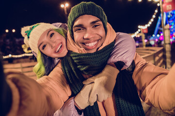 Canvas Print - Photo of excited funky american guy lady wear windbreakers blogging recording xmas video vlog together outside urban market park