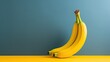  a group of three bananas sitting on top of a yellow table next to a blue and green wall in a room.  generative ai