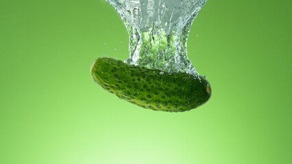 Fototapete - Raw Cucumber Falling into Water.