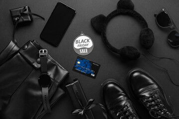 Sticker - Composition with gadgets, female clothes and gifts on dark background. Black Friday sale