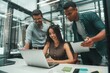 © Friends Stock - Business people. Group of three young and cheerful employees using modern technologies while working in modern office. Job concept