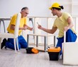 © Elnur - Two contractors carpenters working indoors