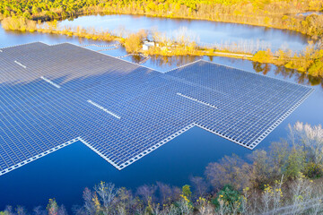 Wall Mural - Pond with floating solar panels that generate electricity from sun by using sunlight to produce electricity